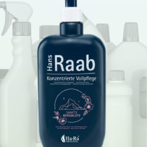 Butelka uniwersalnego koncentratu Ha-Ra o zapachu kwiatów górskich na tle wielu pustych, przezroczystych butelek